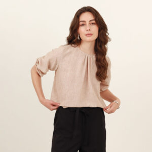 Blusa cuello redondo manga codo globo y prenses