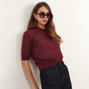 Blusa tejida cuello tipo polo manga corta con textura